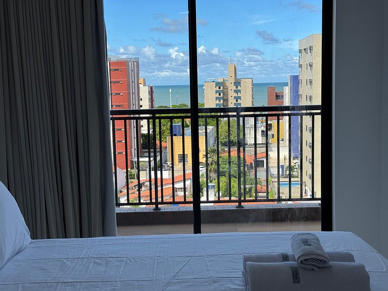 Apto com quarto e sala super varanda e vista AH705