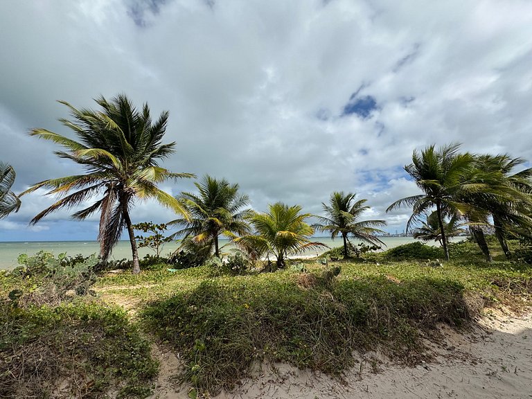 Flat beira-mar pé na areia com varanda