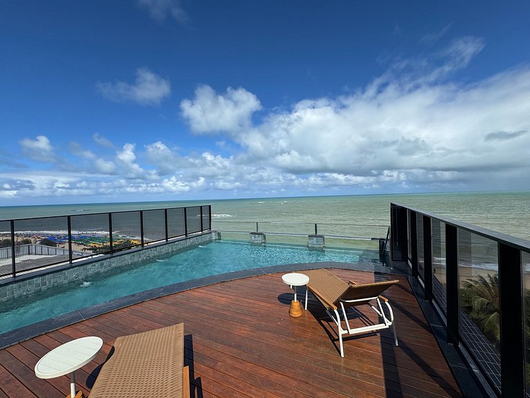 Flat beira-mar pé na areia com varanda AH 409