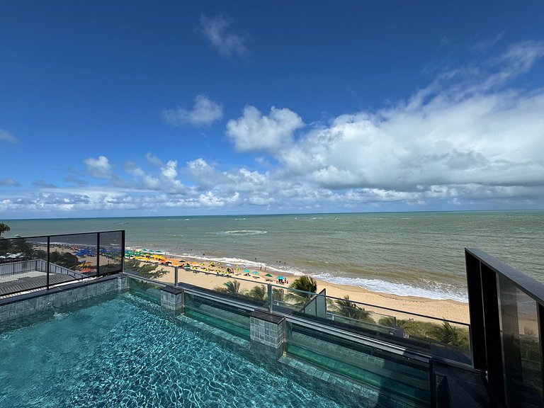 Flat beira-mar pé na areia com varanda