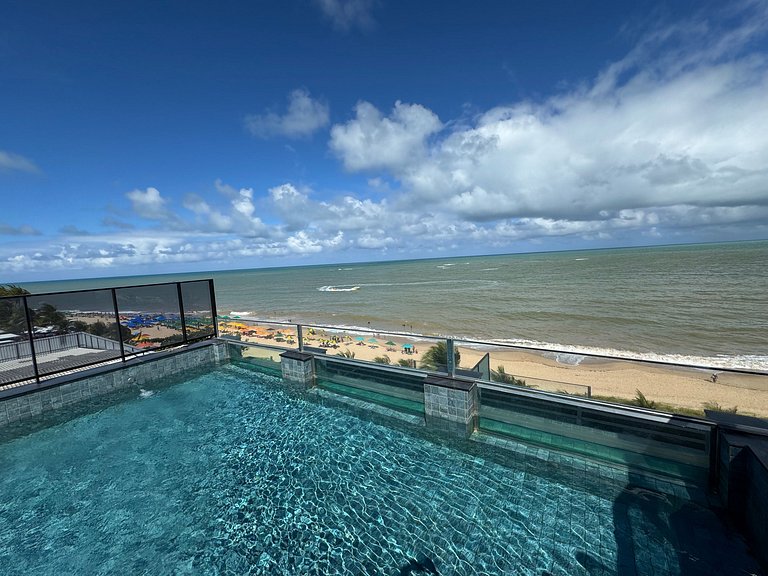 Flat beira-mar pé na areia com varanda AH 409