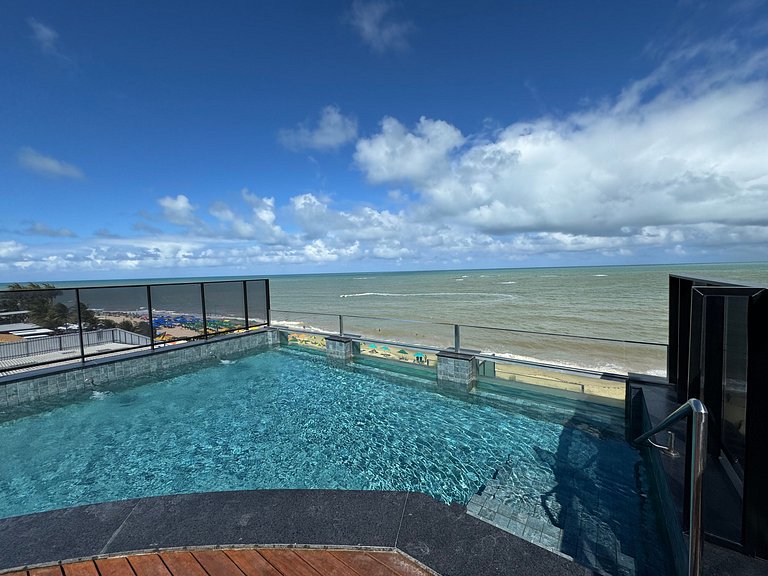 Flat beira-mar pé na areia com varanda