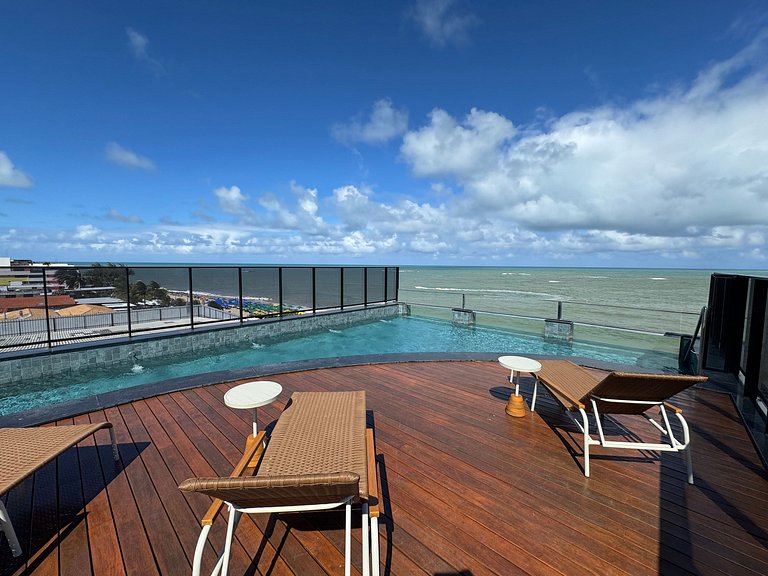 Flat beira-mar pé na areia com varanda