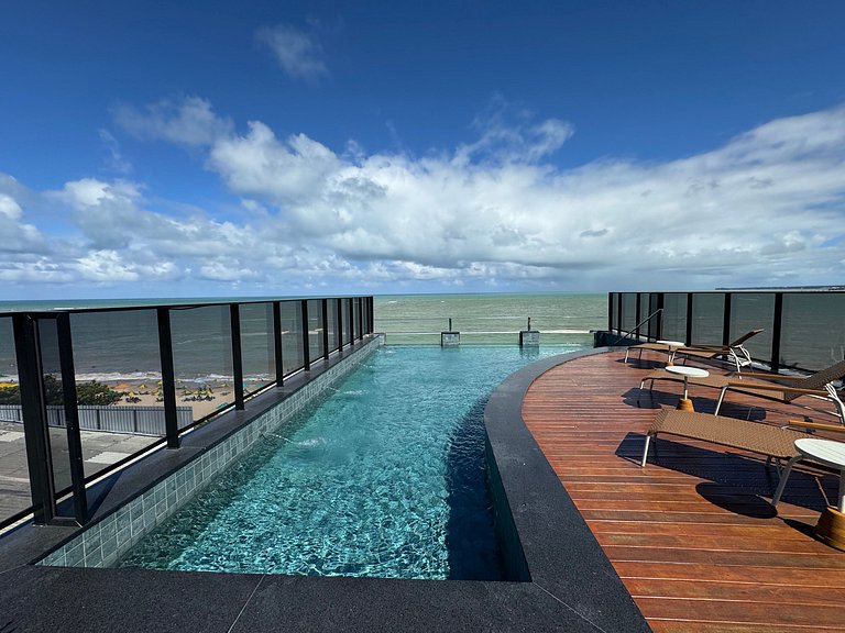 Flat beira-mar pé na areia com varanda
