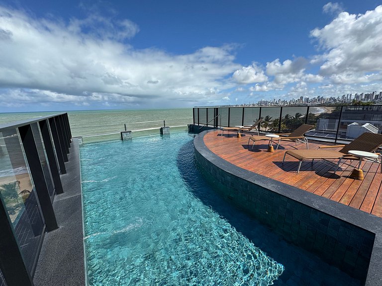 Flat beira-mar pé na areia com varanda AH 410
