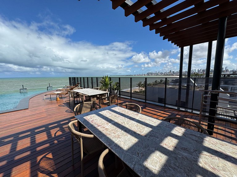 Flat beira-mar pé na areia com varanda AH 410