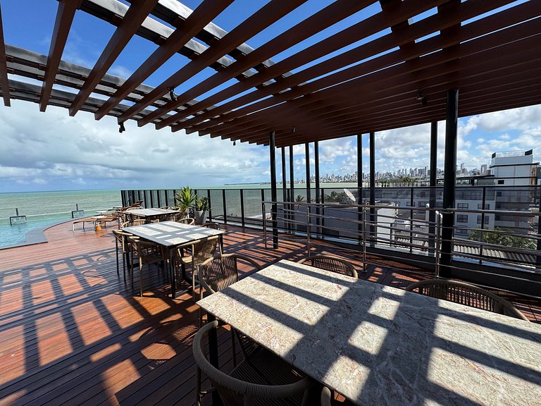 Flat beira-mar pé na areia com varanda
