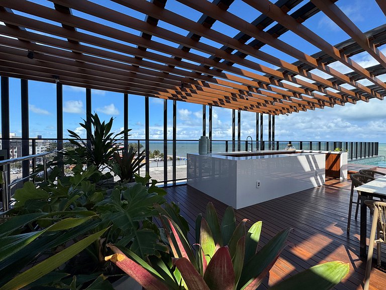 Flat beira-mar pé na areia com varanda