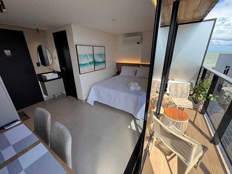 Flat beira-mar pé na areia com varanda AH 410