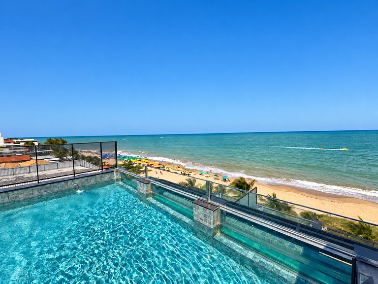Flat beira-mar pé na areia com varanda